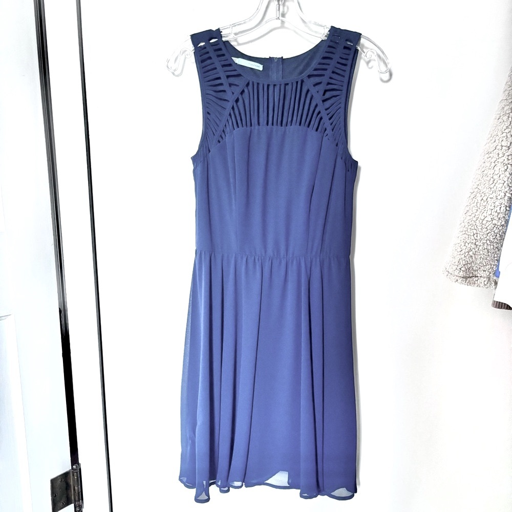 Maurice’s navy dress.‎